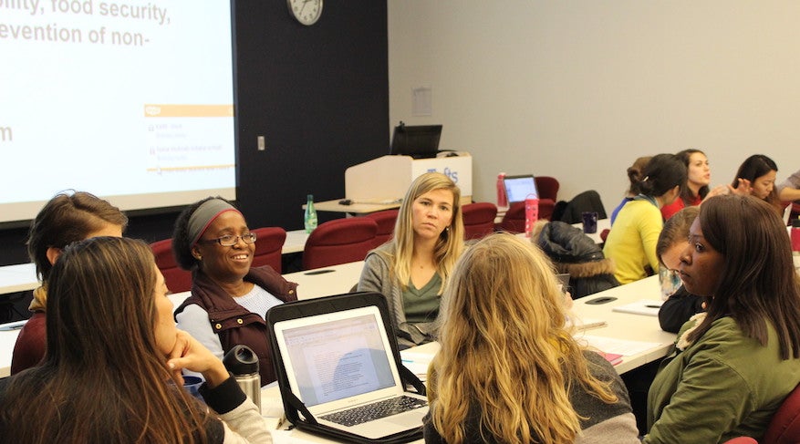 Students and researchers discuss the agenda for the UN event